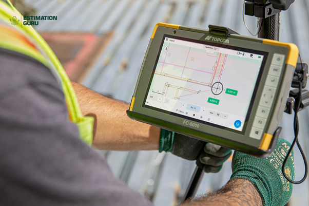 A construction worker uses a Topcon FC-6000 tablet to view building plans on-site
